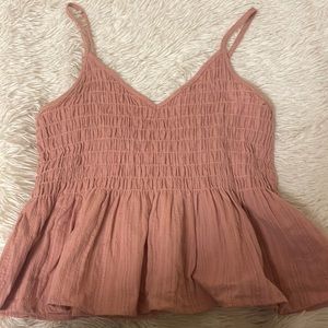 a pink stylish top. really cute to wear in the summer. cute with jeans/sandals.